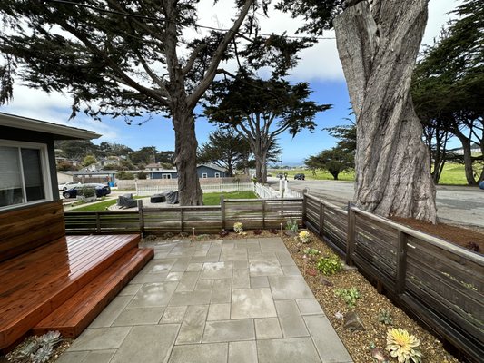 Photo of Earthtones - Pacifica, CA, US. Pacifica paver patio, Redwood fence and deck with succulent garden