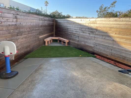 Photo of Life Garden - San Francisco, CA, US. Fake grass and bench.