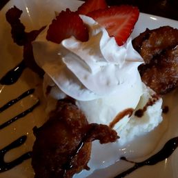 Photo of White Elephant Restaurant - South San Francisco, CA, United States. Fried banana with coconut ice cream