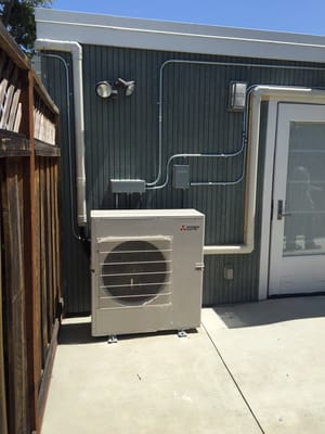 Photo of A Plus Quality HVAC - Daly City, CA, US. Residential heat pump outdoor unit.