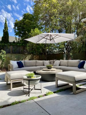 Photo of Terra Gardens - Berkeley, CA, US. a patio with an umbrella and furniture