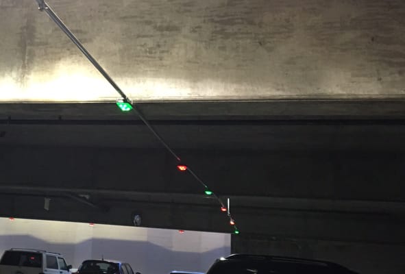 Photo of Civic Center Parking Garage - Alameda, CA, US. Handy indicators for open spots! Red is occupied, green is open, and blue is disabled parking.