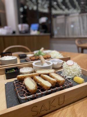 Photo of Saku - Vancouver, BC, CA. a tray of food on a table