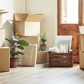 Packing any fragile items with the bubble wrap and boxing them up