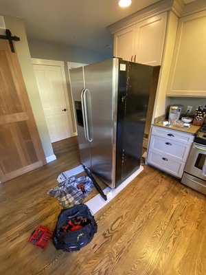 Photo of Gold Standard Appliance Repair - South San Francisco, CA, US. Always protecting your floor. Pulled out GE refrigerator.