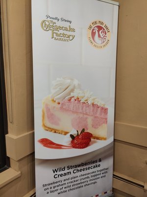 Photo of Peri Peri Shack - Burnaby, BC, CA. a strawberry cheesecake with whipped cream