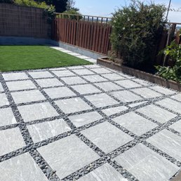 Photo of D Garcia's Landscaping - Richmond, CA, United States. 2x2's with decorative rock in between and artificial turf