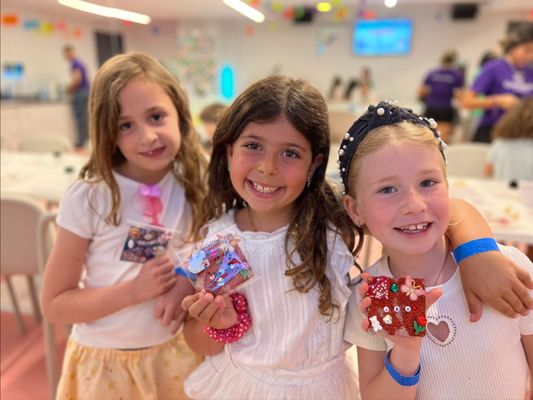 Photo of Genius Gems - NYC - New York, NY, US. Girls who just made Glitter Tiles at Genius Gems NYC.