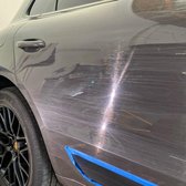 BEFORE: Insane amounts of surface scratches on this Porsche Macan Farm Car.