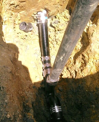 Photo of Ace Plumbing & Rooter - San Francisco, CA, US. Trenchless high-density polyethylene sewer transition to cast iron house trap installed by Ace Plumbing.