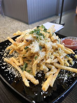 Photo of Frank's Sports Bar and Grill - San Leandro, CA, US. Garlic fries from PorQue No Tacos inside Frank's Sports Bar and Grill