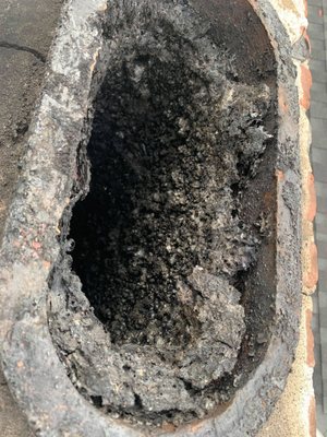 Photo of Duct Pros - San Francisco, CA, US. Dirty chimney flue up to the roof sample