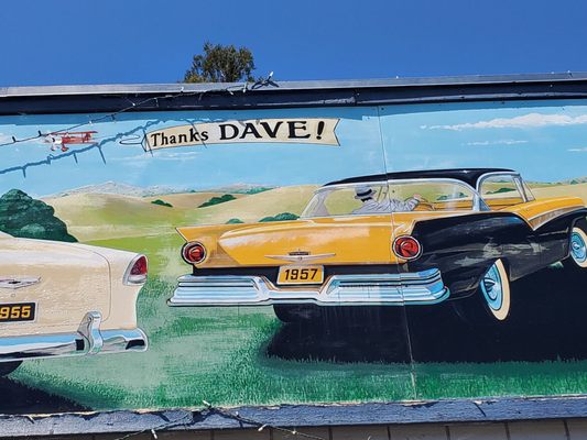 Photo of Dave's Auto Repair - Petaluma, CA, US. David, the owner of Dave's Auto Repair, drove a car up and down Petaluma Blvd. in the movie American Graffiti inspiring the mural