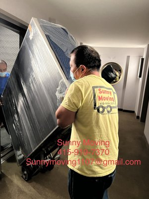 Photo of Sunny Moving Company - Daly City, CA, US. Transporting the heavy dresser