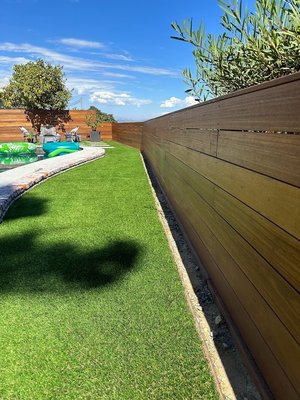 Photo of Jimmy’s Modern Landscape - Redwood City, CA, US. a backyard with a wooden fence