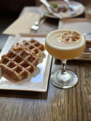 Photo of Medina Cafe - Vancouver, BC, CA. Liege style waffles with Partea cocktail - IG @bougiefoodieboi