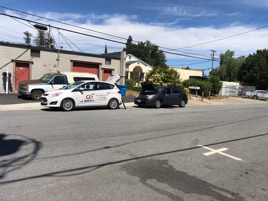 Photo of SafeBuy - San Francisco, CA, US. The picture shows Eran performing a 160-point pre-purchase inspection on a Prius for me.