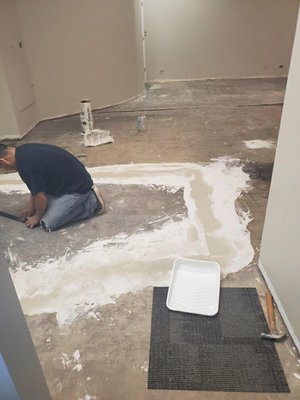 Photo of American Carpet Distributors - Park Ridge, IL, US. Preparing floor for carpet tile