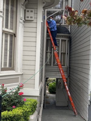 Photo of George Salet Plumbing - Brisbane, CA, US. Carlos is defieing the laws of gravity to get the gas line in !