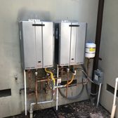 Dual Rinnai tankless water heaters installed in parallel. 