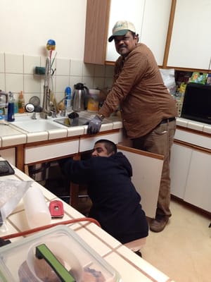 Photo of Pacific Drain & Rooter Service - El Sobrante, CA, US. Nasir and Uncle Neal are installing a Giagni Kitchen Faucet in my kitchen:  Thank you so much!!