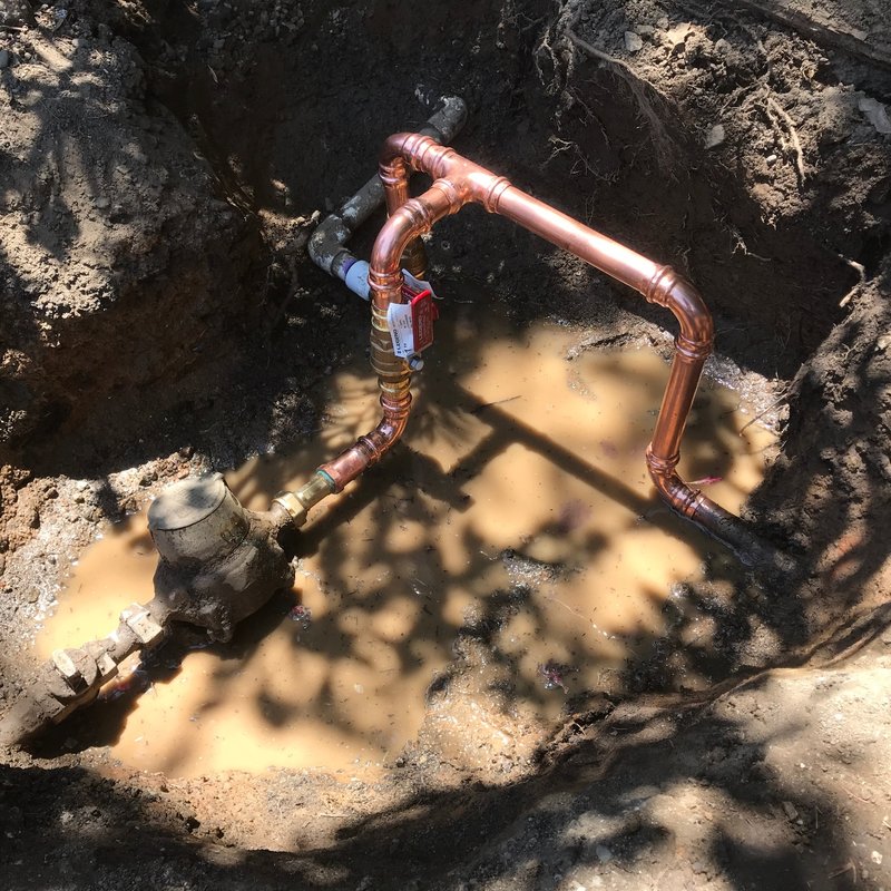 Reroute the water main, add water shut off valve