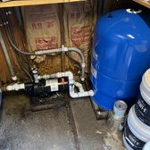 Installed well pump and pressure tank