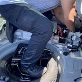 Our Hybrid Specialist, EZ, removing a faulty battery from a customers Toyota Prius.