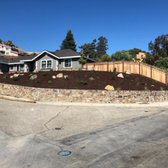 Retainer wall creates stability while enhancing the home's curb appeal