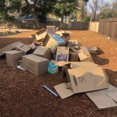 Cardboard boxes staged for removal.