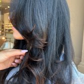 Womans haircut with styled blowout