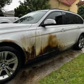Drove through tar on the road, splattered over rims and exterior paint. A hot mess! 