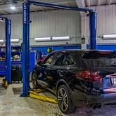 Porsche in the shop for brake service and inspection.