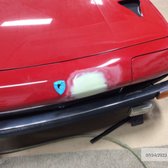 dented front panel on Lamborghini 