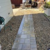 After - paver installation, pathway and decorative rock with landscape fabric installation