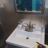 Bathroom faucet and drain installation