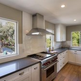 Columbia Kitchen Cabinets: Shaker Door Style in Iceberg color for Perimeter cabinets and Whale Grey color for island.  Quartz Countertops.