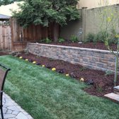 Finished newly landscaped and long lasting retaining wall