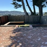 Brick herringbone pattern patio.