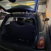 Mini stuck with a dead battery deep in a San Francisco parking garage.  Battery in trunk, replaced while owner was at work.  
