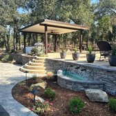 WATER FEATURE, RETAINING WALL, & PERGOLA !