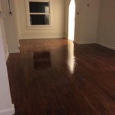 Gorgeous original redwood floors were completely covered in paint overspray and drywall dust.