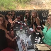 Guests enjoying a delightful wine tasting experience during our Napa Valley tour