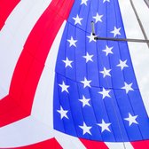 Our massive American flag sail is an inspiring backdrop for your event on Sailing Islander!