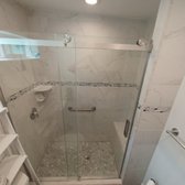 tile laying, shower door installation.