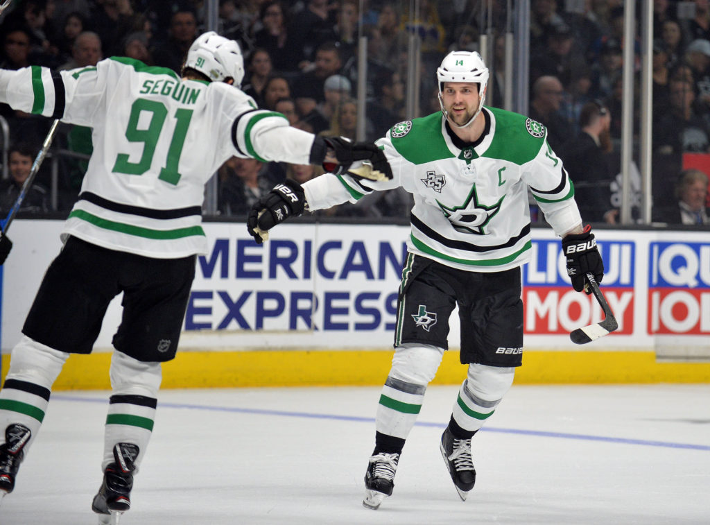 April 7, 2018; Los Angeles, CA, USA; Dallas Stars left wing Jamie Benn (14) celebrates with center Tyler Seguin (91) his third goal of the game scored against the Los Angeles Kings during the first period at Staples Center. Mandatory Credit: Gary A. Vasquez-USA TODAY Sports