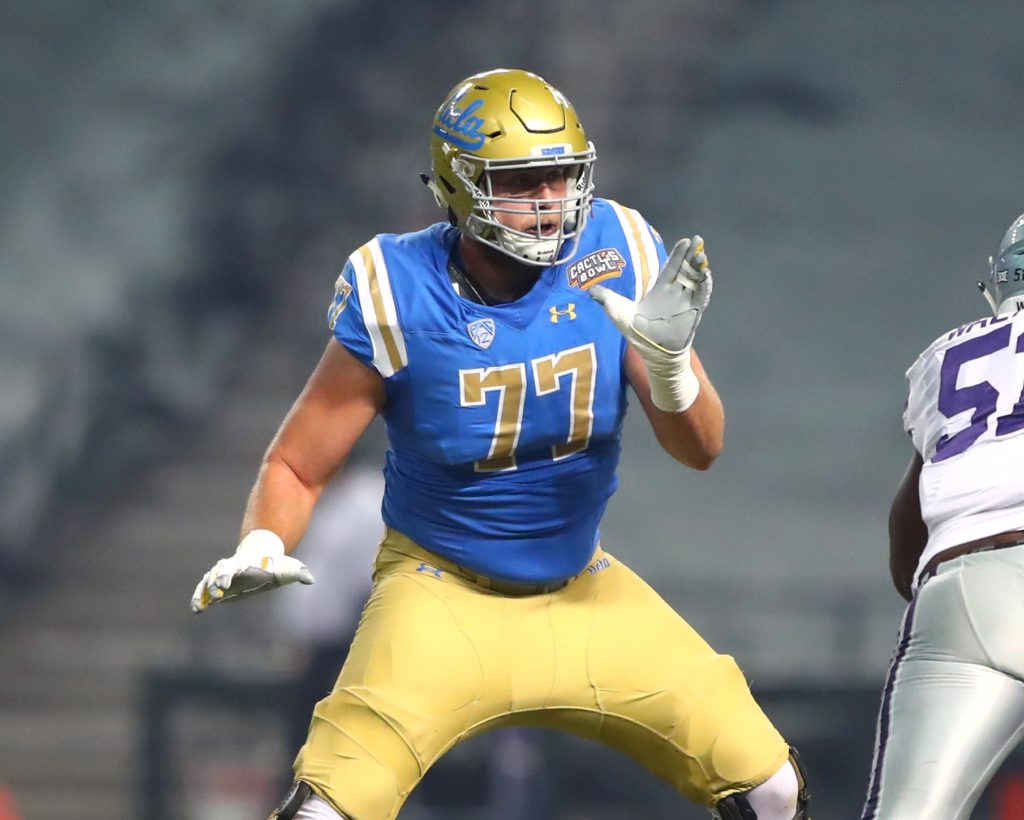 Dec 26, 2017; Phoenix, AZ, USA; UCLA Bruins offensive lineman Kolton Miller (77) against the Kansas State Wildcats in the 2017 Cactus Bowl at Chase Field. Mandatory Credit: Mark J. Rebilas-USA TODAY Sports