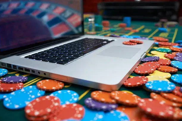 Casino chips with a laptop