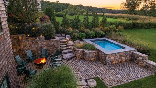 A plunge pool with a stone finish