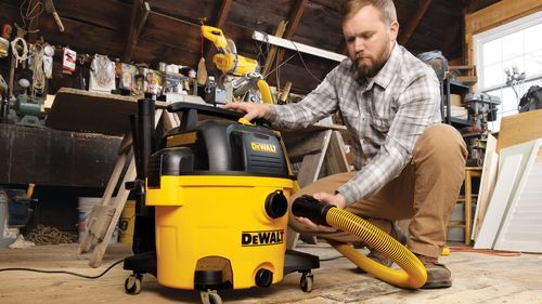 Nathan Gilbert setting up a Dewalt shop vac